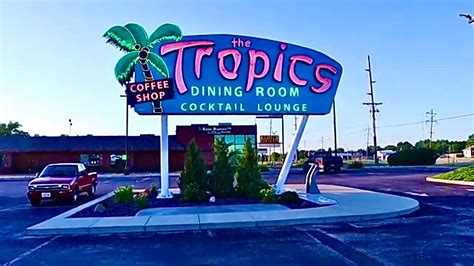 Tropics restaurant - This restaurant has lakefront seating on the marina. The interior is tiki and beach themed. The bartender served drinks and waited tables and did a phenomenal job on a busy day! My grouper bites were delicious with just the right amount of breading. There is a wide variety of tropical drinks. This is 4.5 stars very close to 5, will be back.
